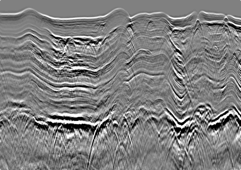 The same stack section after deghosting in g-Platform, with a broadband spectrum and sharper, better-resolved reflectors