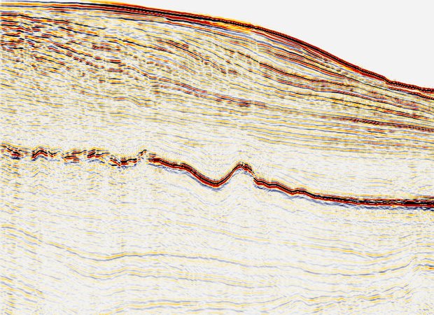 The same stack section after multiple attenuation in g-Platform, with the repeated events removed and the primary reflectors continuous